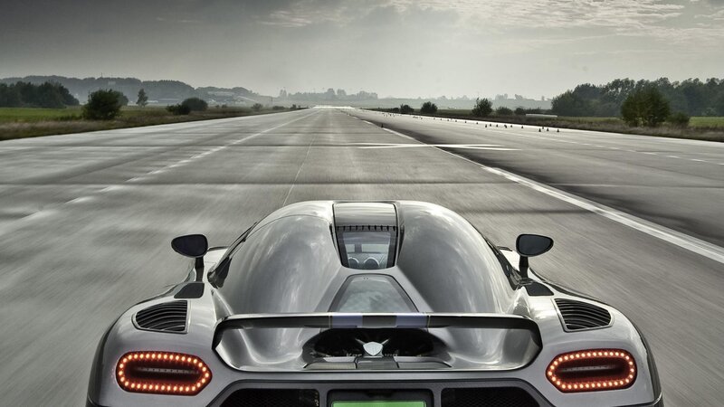 silver sports car on runway