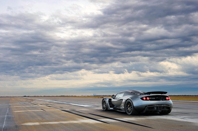 Silver sports car on runway