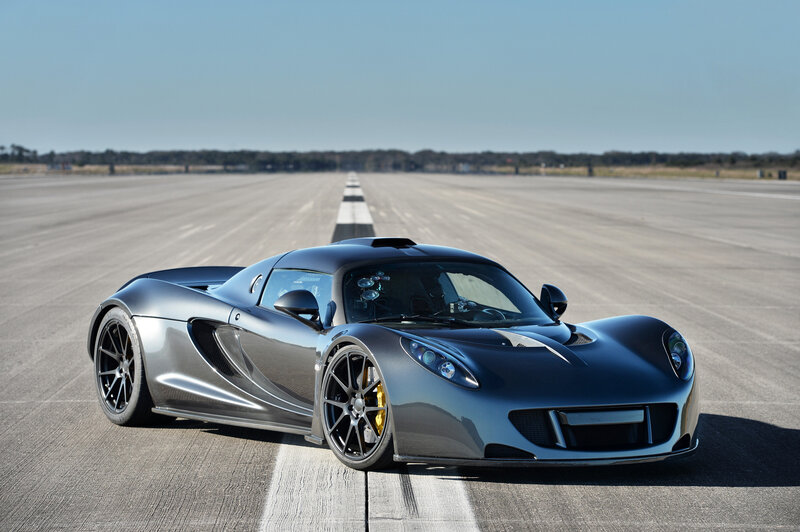 Silver sports car on runway
