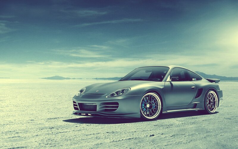 silver sports car on salt flat