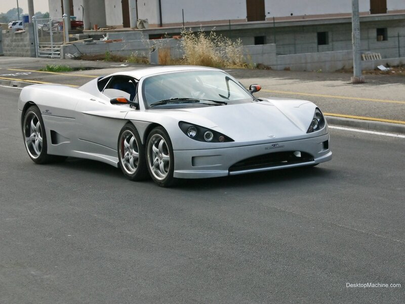 silver sports car on street