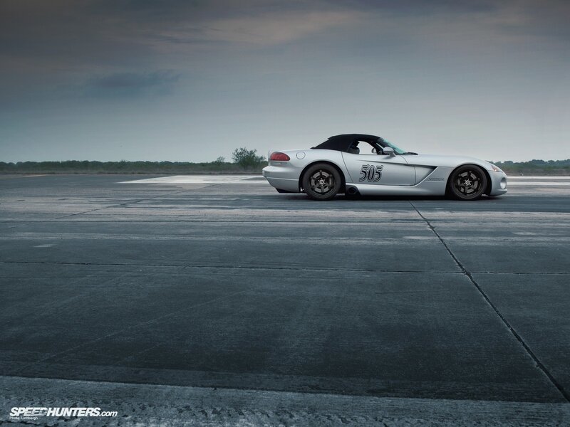 Silver sports car on tarmac