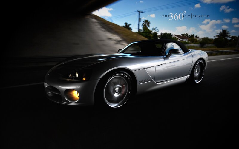 Silver sports car on the road