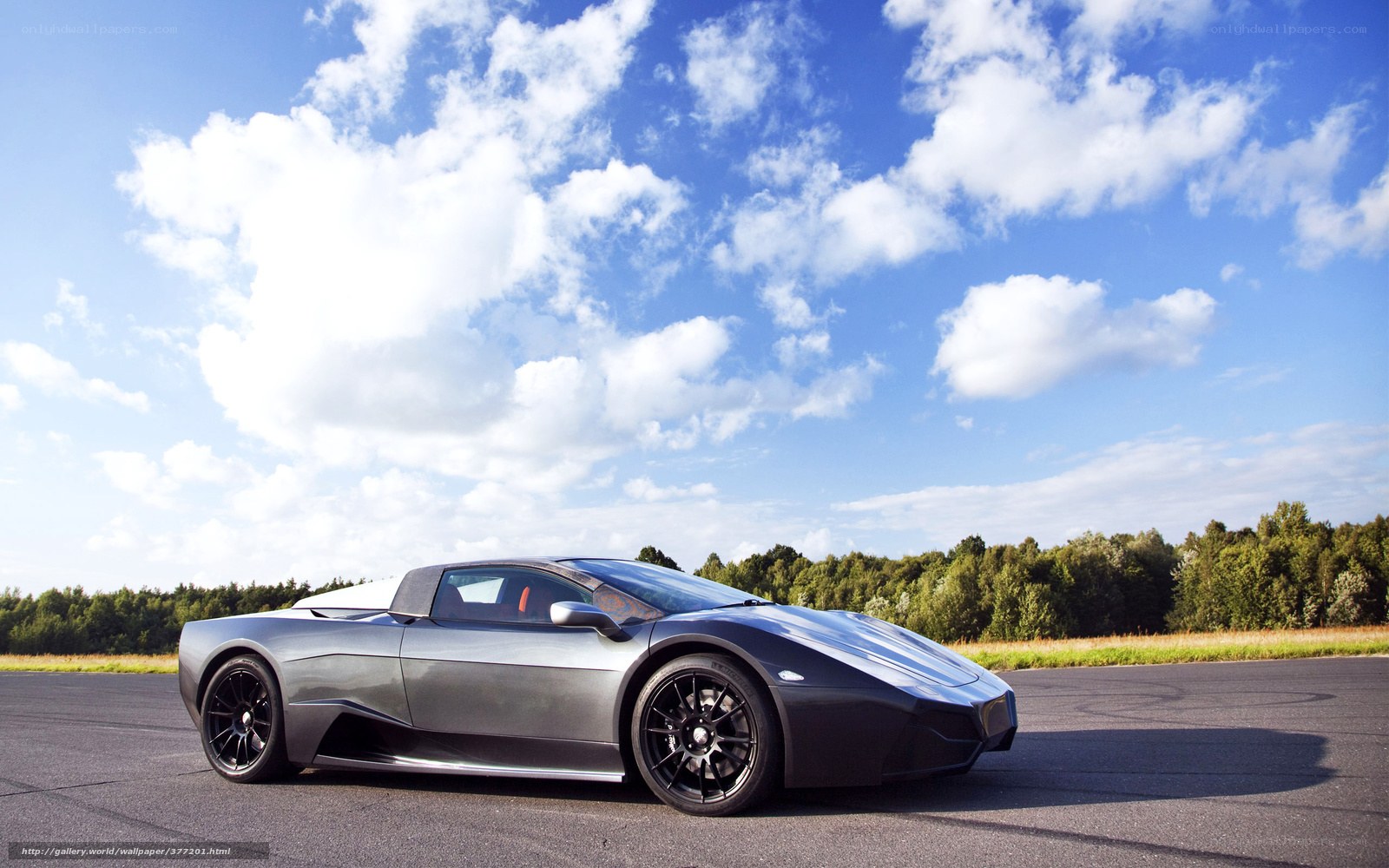 Silver sports car on track