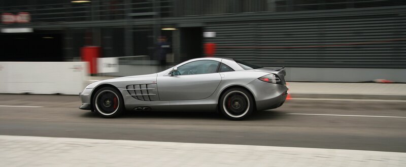 silver sports car on track