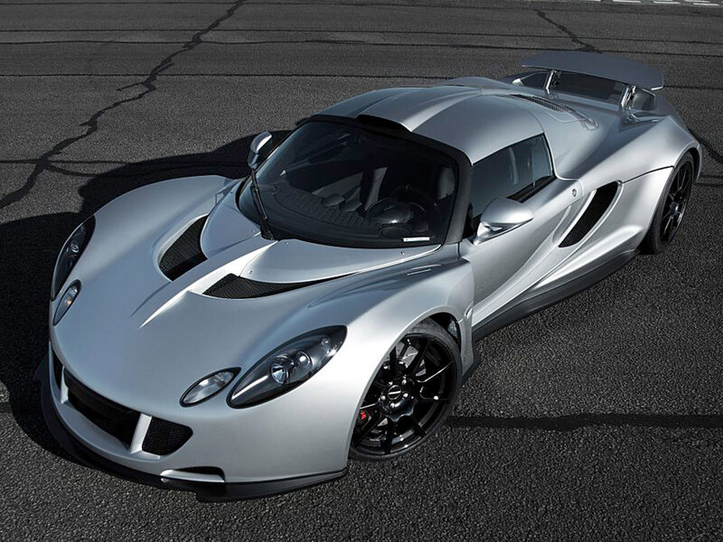 silver sports car on track