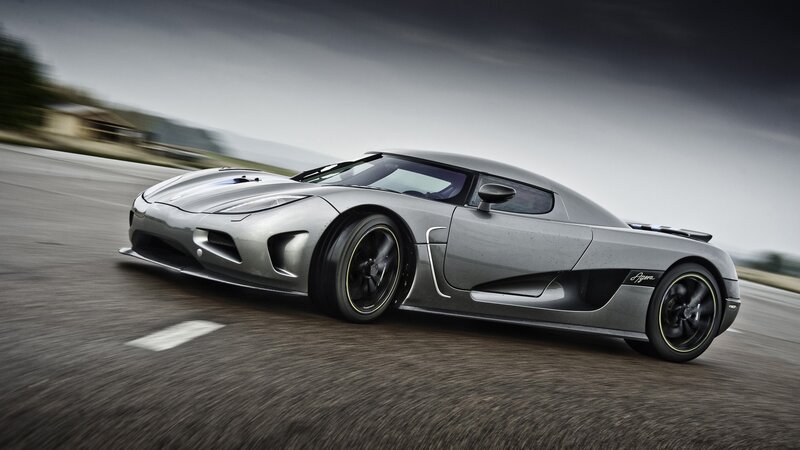 silver sports car on track