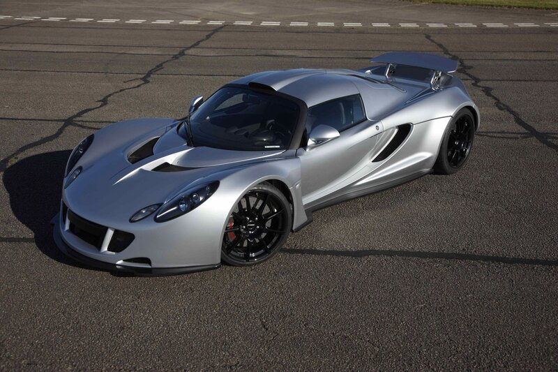 silver sports car on track