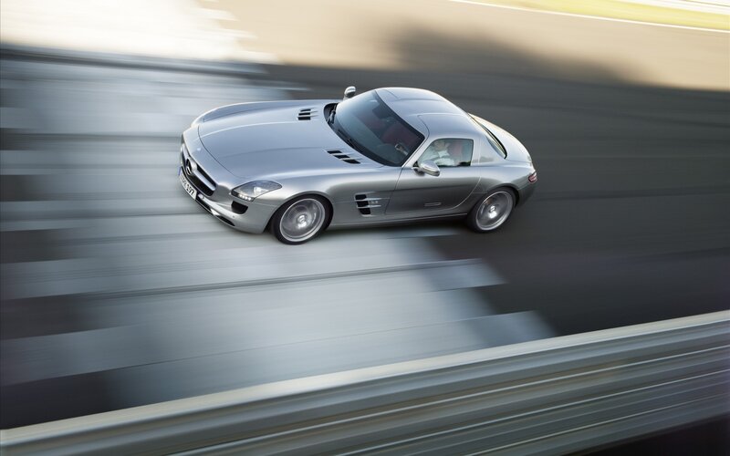 silver sports car on track