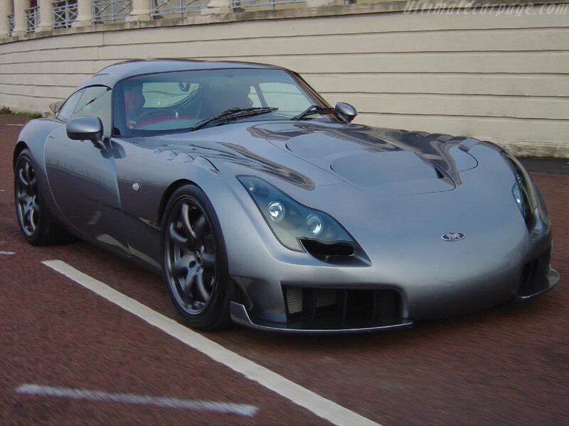 silver sports car on track