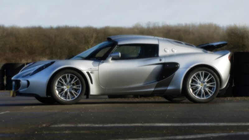 silver sports car on track