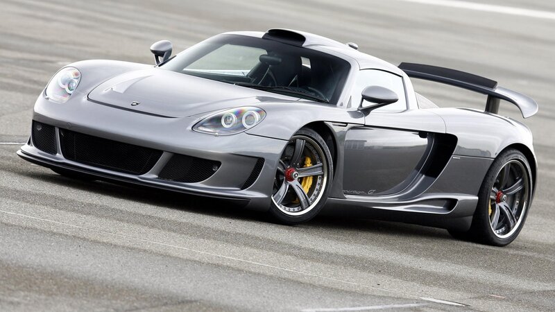 silver sports car on track