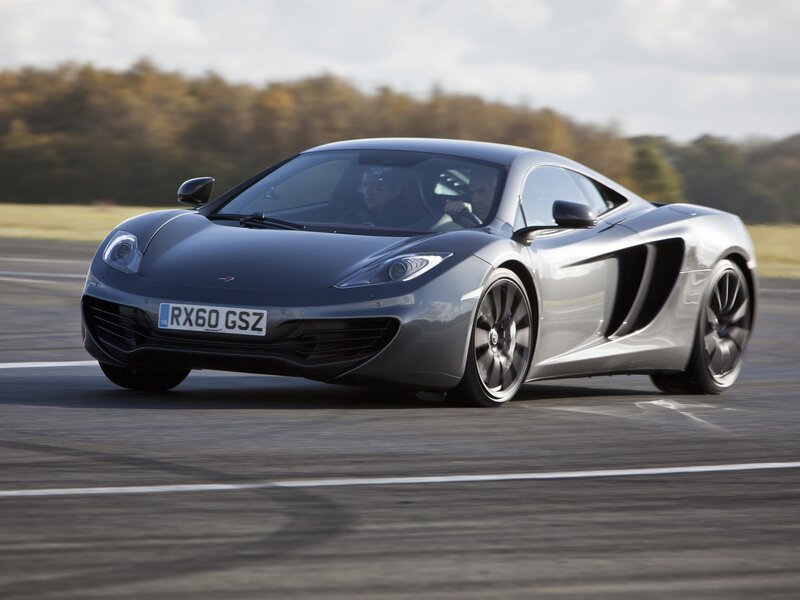 silver sports car on track