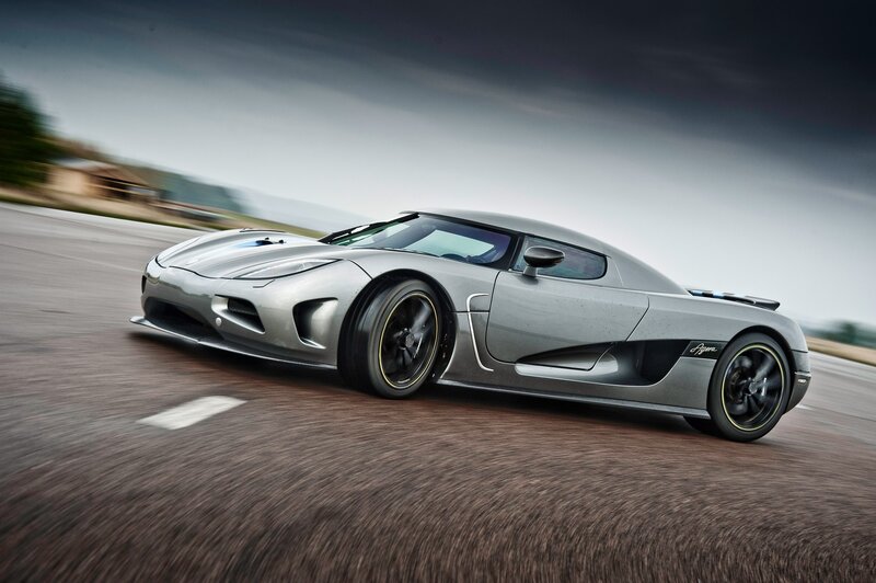 silver sports car on track