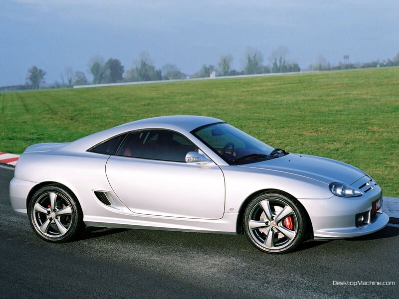 silver sports car on track