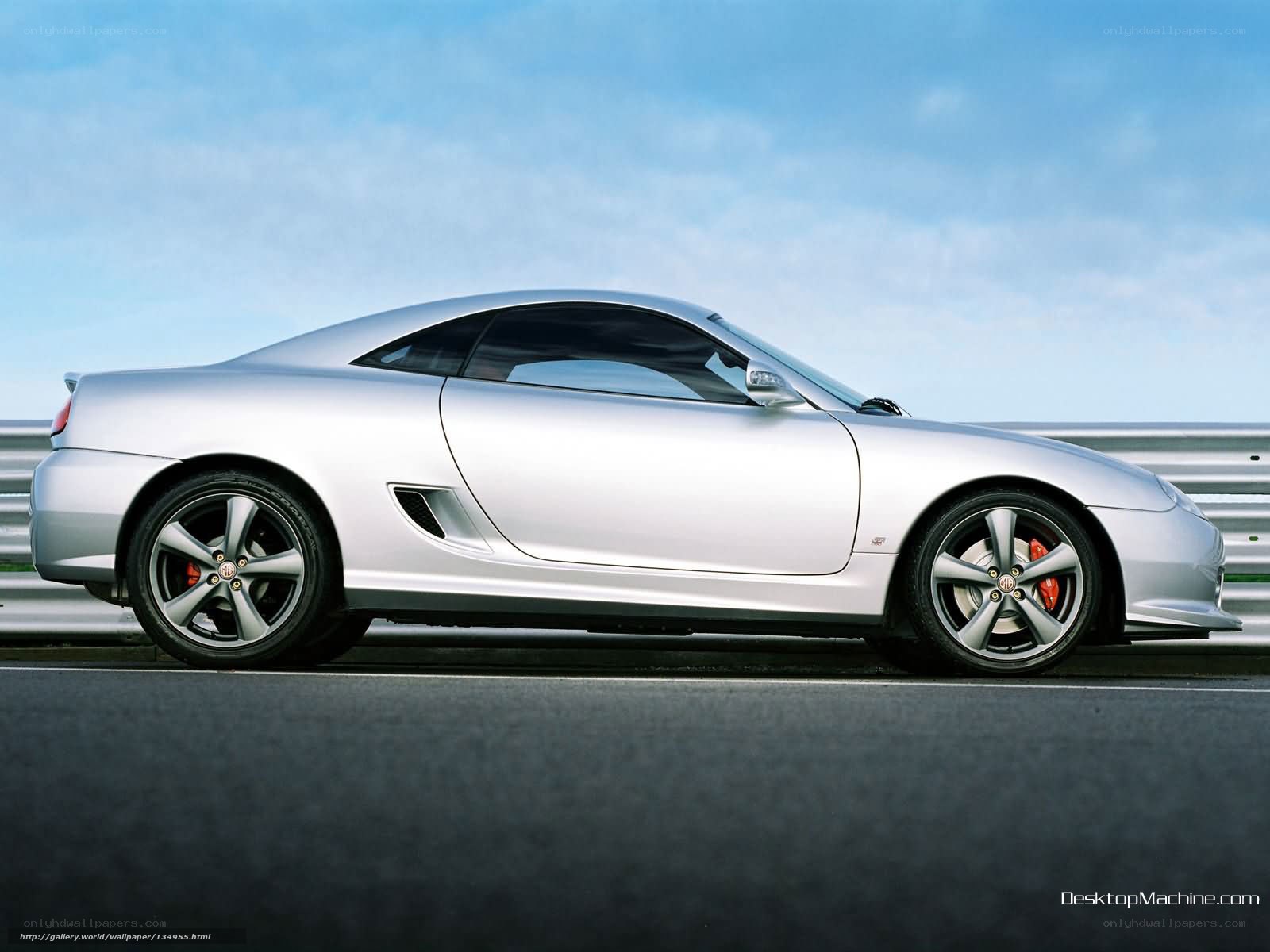 silver sports car on track