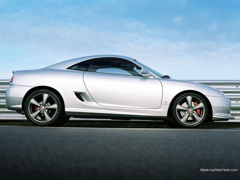 silver sports car on track