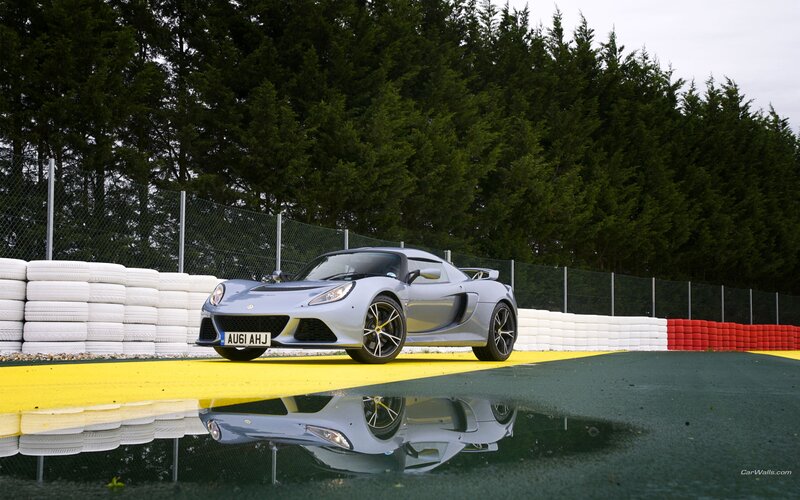 silver sports car on track