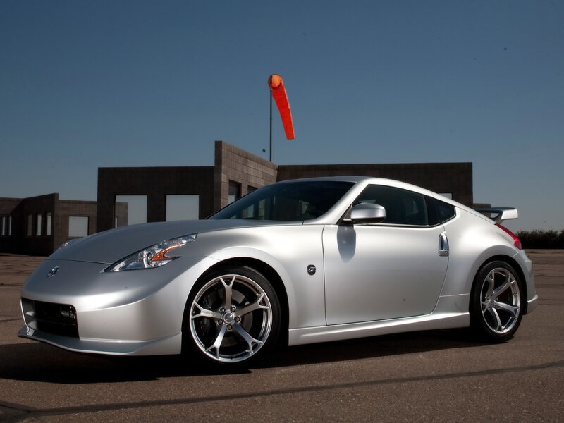 silver sports car on track