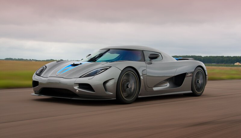 silver sports car on track