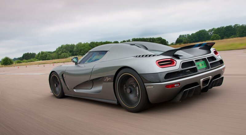 silver sports car on track