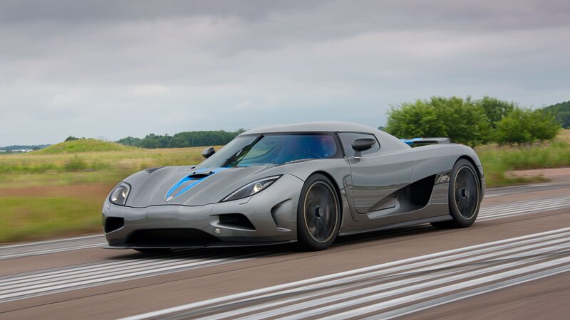 silver sports car on track