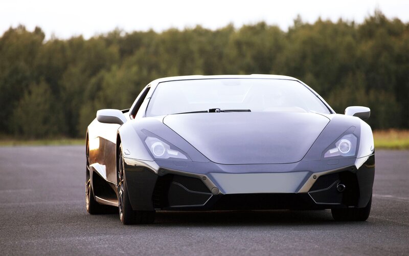 silver sports car on track