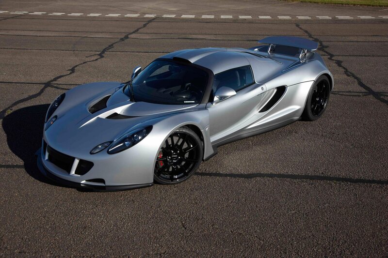 silver sports car on track