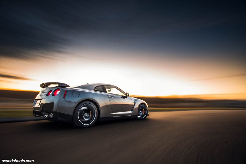 silver sports car on track