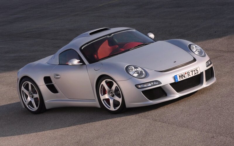 silver sports car on track