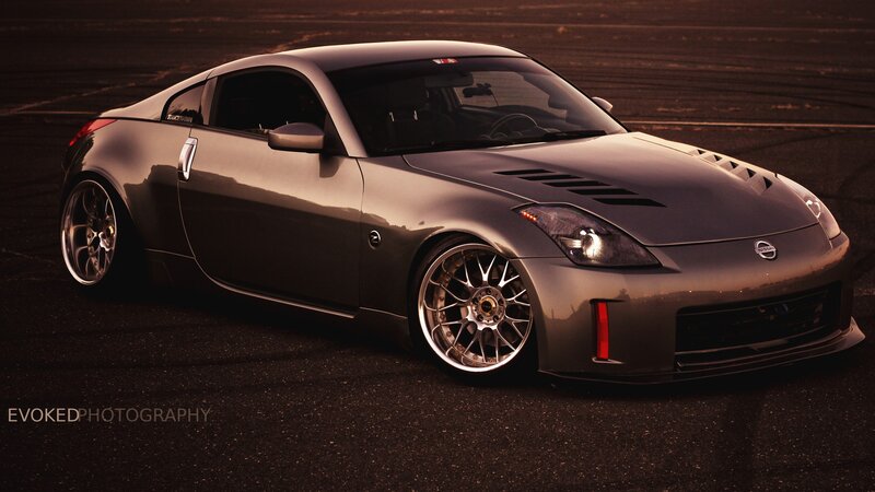 silver sports car on track