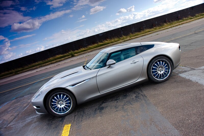 silver sports car on track