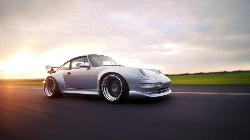 silver sports car on track