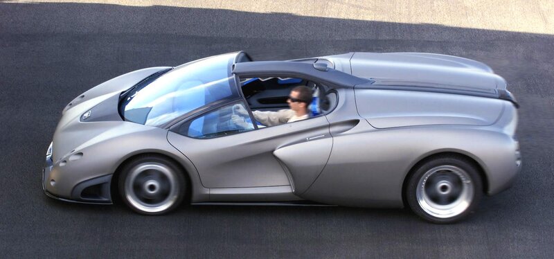 silver sports car on track