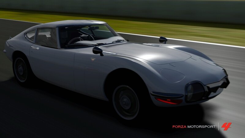 silver sports car on track