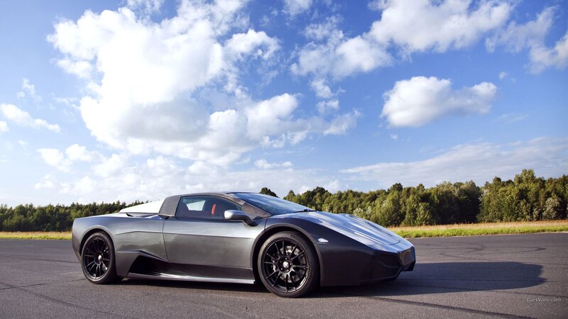 silver sports car on track
