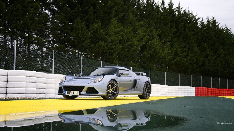 silver sports car on track