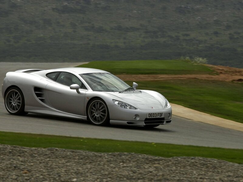 silver sports car on track