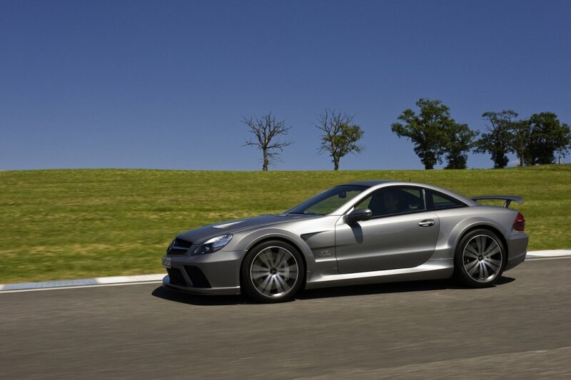 silver sports car on track