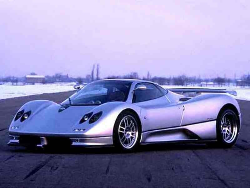 silver sports car on track