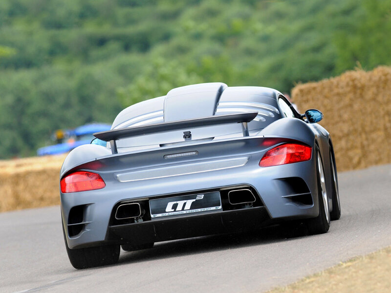 silver sports car on track