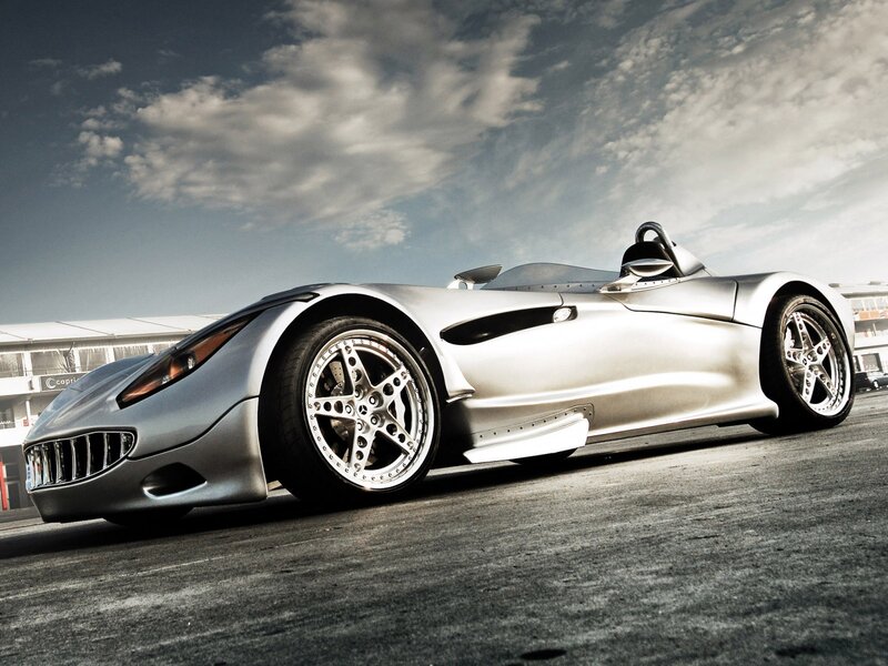silver sports car on track
