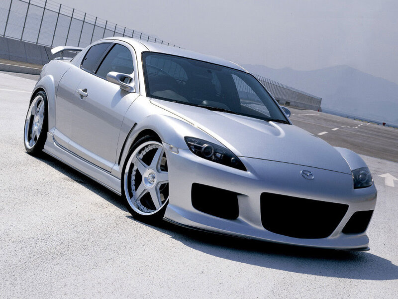 silver sports car on track
