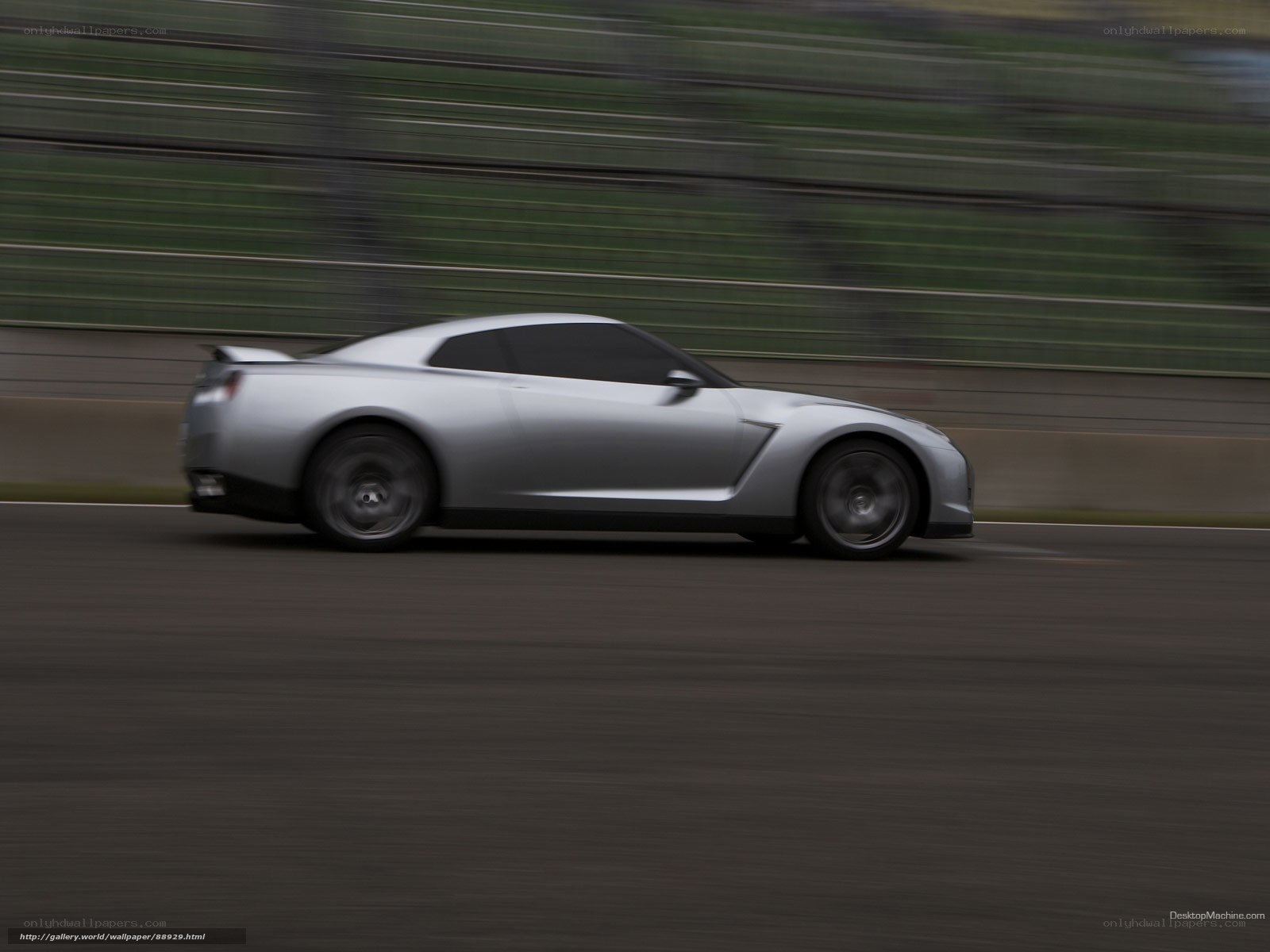 silver sports car on track