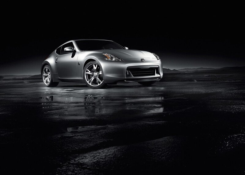 Silver sports car on wet road