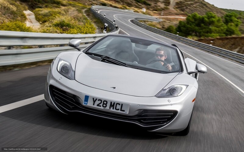 silver sports car on winding road