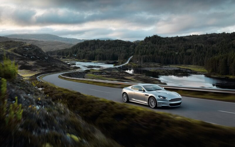 Silver sports car on winding road