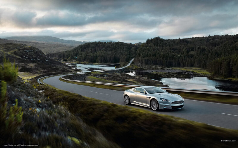 Silver sports car on winding road