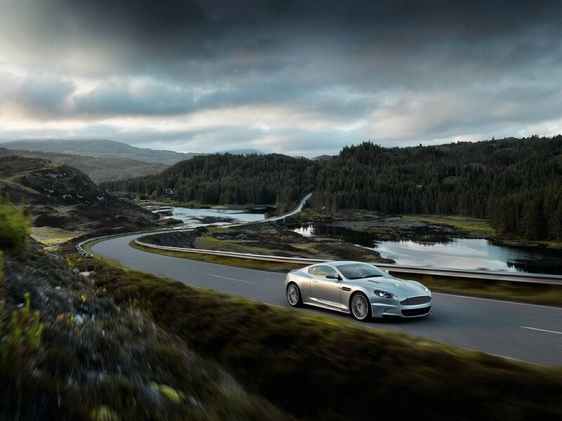 Silver sports car on winding road