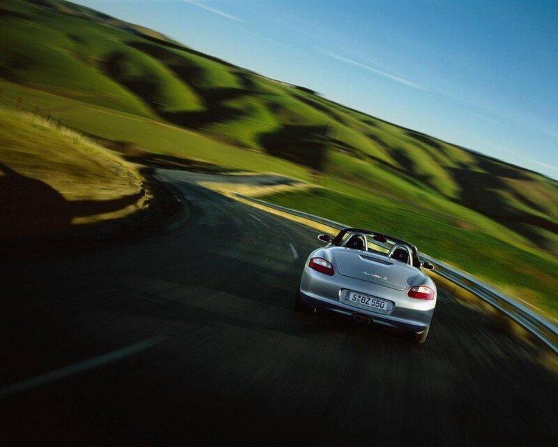 Silver sports car on winding road